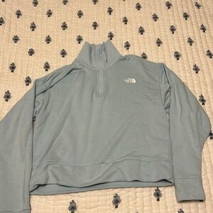 A north face quarterzip sweatshirt